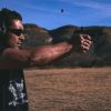 john valentine shooting a pistol