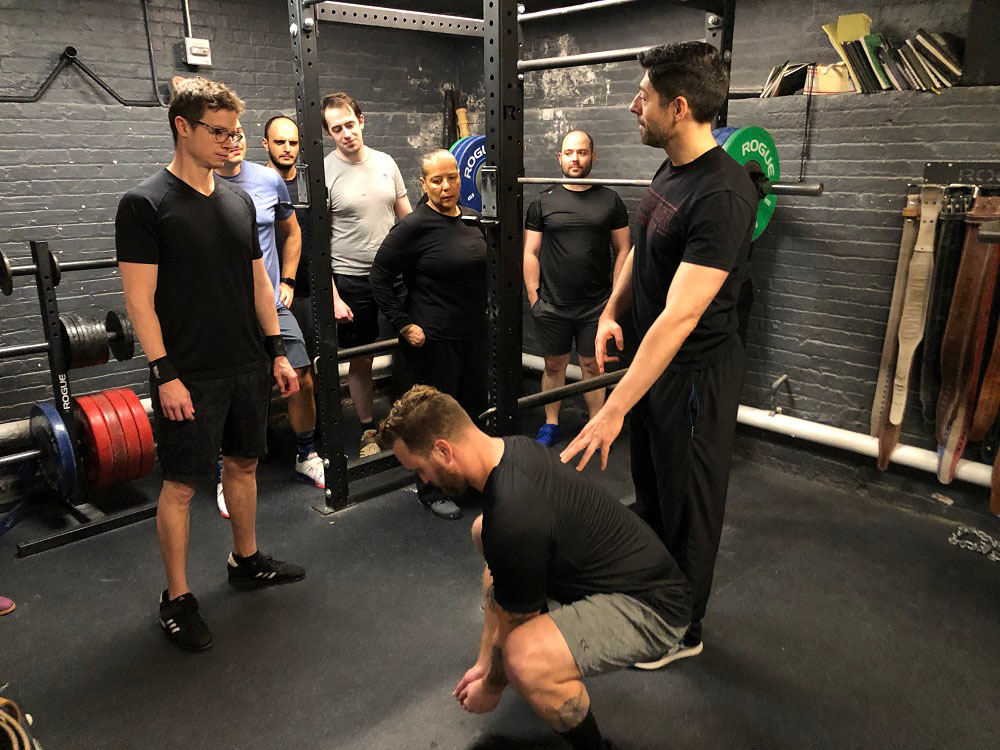 hayden courtland teaching the squat