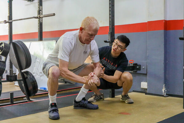 marvin teaching the squat