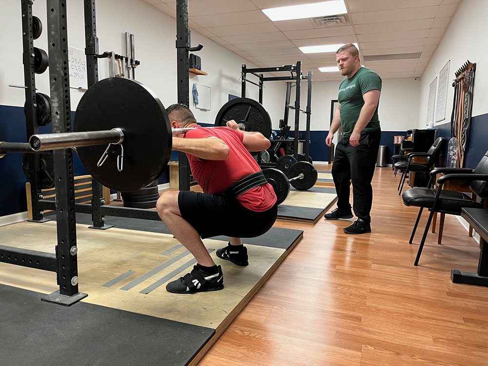 andrew lewis coaching the squat