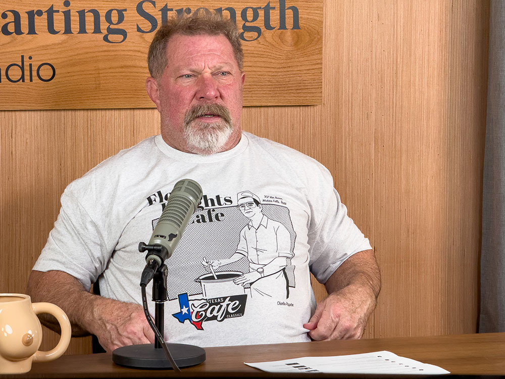 mark rippetoe wearing the floral heights cafe shirt on starting strength radio