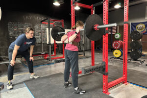 sam krapf coaching the squat